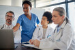 © Kirsten Davis/peopleimages.com - Teamwork, healthcare and planning with a doctor, nurse and medicine team at work on a laptop during a meeting. Collaboration, research and insurance with a medical group working in the hospital