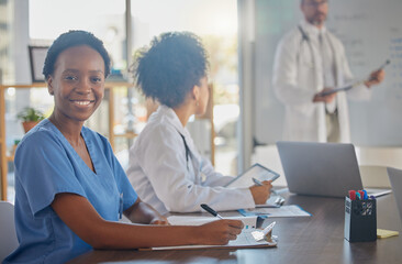 Poster - Medical meeting, portrait and African doctor writing notes in a nursing workshop for training at a hospital. Happy, professional and black woman nurse in a seminar for medicine at a clinic at work