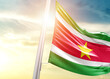 Suriname national flag cloth fabric waving on the beautiful sunlight - Image