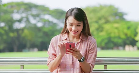 Poster - woman use phone in park