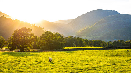 Sunset over Ullswater lake in Lake District, a region and national park in Cumbria in northwest England