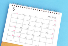 Calendar May 2023 Top View On A Blue Background