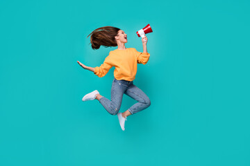 Wall Mural - Full length photo of young adorable funny playful carefree woman hold loudspeaker scream protest jumper isolated on aquamarine color background