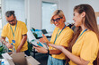 © Zamrznuti tonovi - Group of volunteers working in community charity donation center