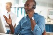 © Charlize D/peopleimages.com - Black businessman call center conversation in office, working at help desk online telemarketing company. Customer service support, consultant talking on microphone and career success to contact us