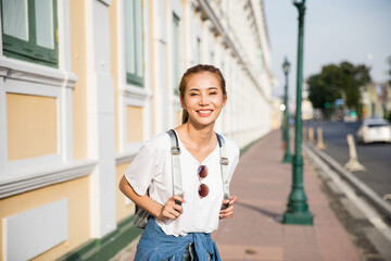 Wall Mural - Young Asian Lady Backpacker