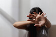 © eakgrungenerd - Close up focus of hand woman showing to stop violence fear abuse. domestic pain, trafficking concept.