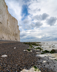 Poster - rocky beach at Birling Gap with the cliffs of the Seven Sisters in the background on the Jurassic Coast of East Sussex