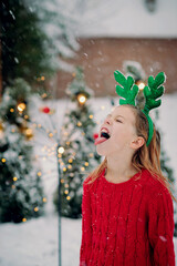 Wall Mural - child playing with snow