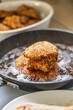 © weyo - Schnitzels with sesame seeds in a frying pan