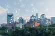 Panoramic skyline view of Broadway district of Nashville over Cumberland River at day time, Tennessee, USA. Decentralized economy. Blockchain, cryptocurrency and cryptography concept, hologram