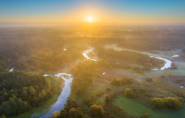 Wall Mural - beautiful autumn foggy sunrise over the river