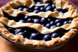 tasty blueberry pie, a high calorie baked food item, sweet and sugary