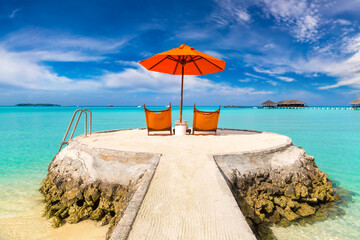 Sticker - Sun bed and parasol at tropical beach