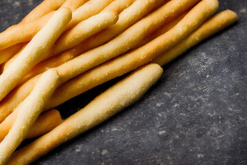 Wall Mural - a photo of breadsticks, crusty baked food item, high calorie snack