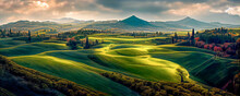 Beautiful And Miraculous Colors Of Green Spring Panorama Landscape Of Tuscany, Italy. Tuscany Landscape With Grain Fields, Cypress Trees And Houses On The Hills At Sunset. 