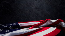 Veterans Day Banner With US Flag, Black Slate Background And Copy-Space.