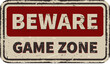 Beware game zone vintage rusty metal sign