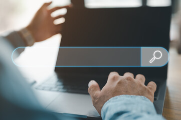 Leinwandbilder - Data Search Technology Search Engine Optimization. man's hands are using a computer notebook to Searching for information. Using Search Console with your website.