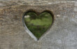 © Westend61 - Heart shape carved on wooden plank