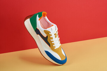 fashionable sneakers on colorful background. stylish sports casual shoes. creative minimalistic layo