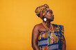 © Jacob Lund - Stylish African woman wearing a cultural attire in a studio