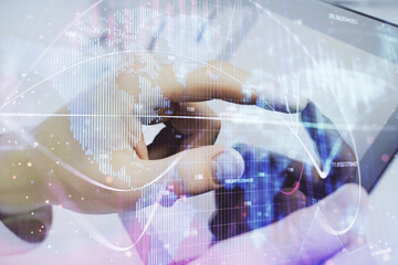 Aufkleber - Double exposure of man's hands holding and using a phone and international business theme drawing.