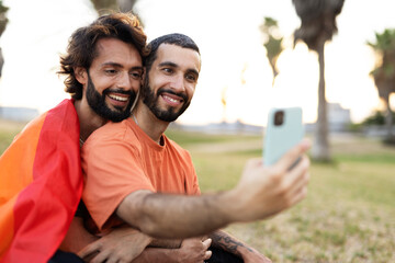 Wall Mural - Happy couple taking selfie photo. LGBT community..