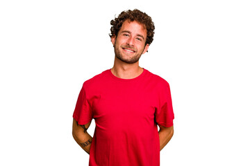 Wall Mural - Young caucasian curly hair man isolated Young caucasian man with curly hair isolated happy, smiling and cheerful.