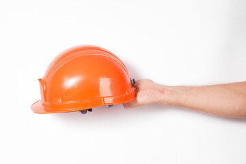 Poster - male hand holding orange building paint isolated on white