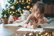 © Anna Lurye - Little girl writing a letter to Santa