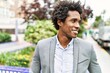 © Krakenimages.com - Young african american businessman smiling happy standing at the city.