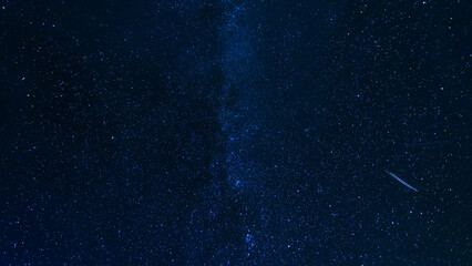 Wall Mural - blue starry night sky with the milky way and galaxies. Astrophotography with many stars and constellations
