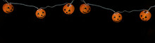 Happy HALLOWEEN Party Celebration Background Banner Panorama - Fairy Lights, String Of Lights With Funny Orange Glowing Halloween Pumpkins In The Dark Night