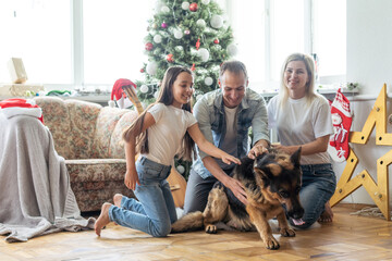 Wall Mural - Christmas Family Portrait In Home Holiday Living Room, Kid and dog play, Present Gift Box, House Decorating By Xmas Tree