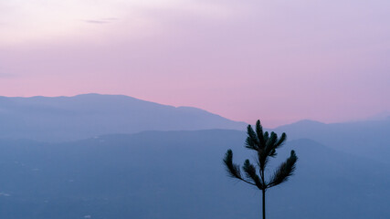 Wall Mural - Photograph of a sunrise over the mountains, first ray of sun