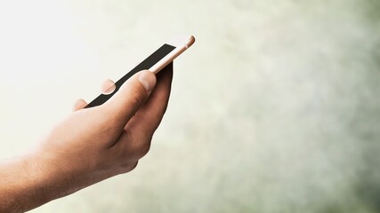 Poster - Person's Hand with modern new Smartphone and blank screen.