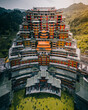 © AmazingAerialAgency - Aerial view of abandoned not finished massive castle in Guizhou province.