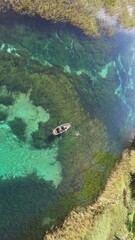 Canvas Print - Drone shot of kayak tour on Rainbow River, Florida