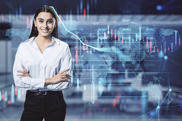 Wall Mural - Attractive happy young european businesswoman with glowing candlestick forex chart and map hologram on blurry office interior background. Stock, investment, market and money concept. Double exposure.