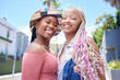 © Wesley J/peopleimages.com - Friends, fashion and vacation with a black woman and sister outdoor in the city for fun, holiday or travel. Happy, smile and together with a young African American female and her friend outside