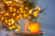 © Maya Kruchancova - cup with hot drink on background christmas tree