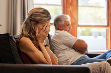 Canvas Print - Crying, divorce and fight with a senior woman sad in her home after an argument with her husband. Depression, stress and couple with a wife angry after fighting with her elderly man sitting on a sofa