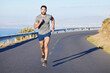© Wesley J/peopleimages.com - Fitness, man and running on a mountain road in South Africa for healthy cardio workout in the outdoors. Active athletic male runner in sports training having a run on the street in nature