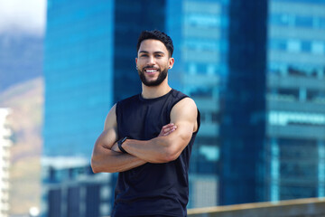 Poster - Fitness, exercise and city with a sports man outside for health, wellness or a running workout. Training, sport and healthy with a male athlete standing arms crossed in an urban town alone