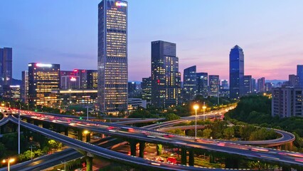 Poster - crowd traffic on viaduct in modern city at twilight