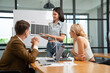 © kelvn - Green alternative energy concept. Business person meeting on solar cell panel technology.