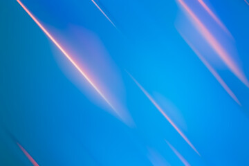 Wall Mural - Abstract futuristic neon lines glowing pink slanted stripes comet meteor falling light traces with gradient blue background banner