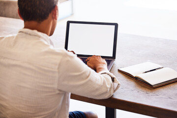Laptop, mockup space and businessman doing research on the internet with technology in modern office. Corporate manager typing email, management project or company report on computer with copy space.