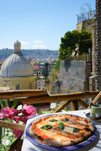 Pizzeria Overlooking Naples City, Italy